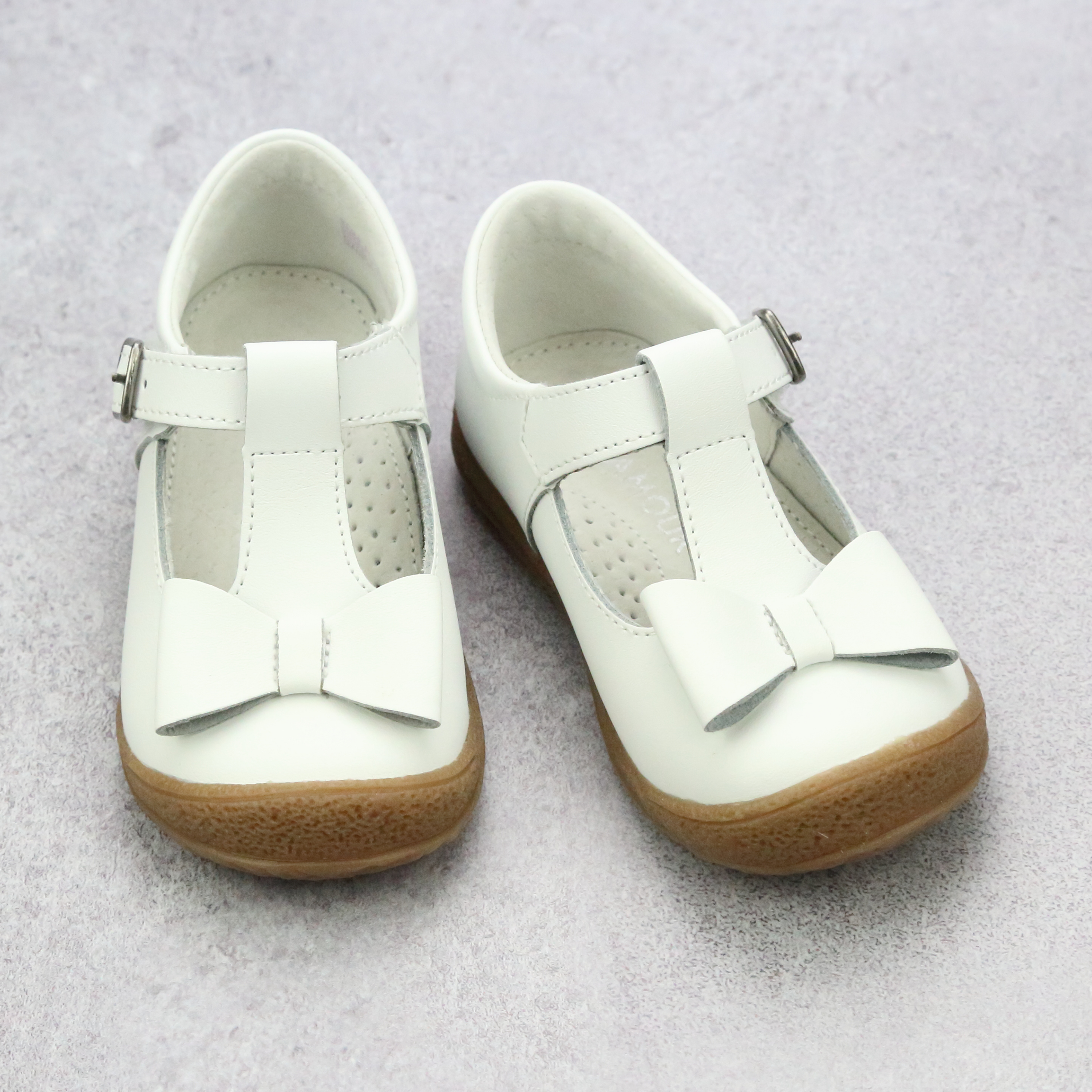 White t 2025 strap mary janes